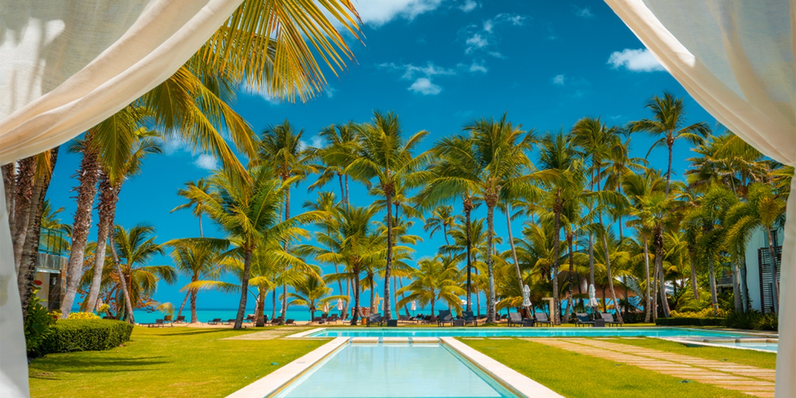 Instyle Touristik – DomRep – ©Latinconnect – Einsteigerreise Sublime Samana – Pool, canal views, beach, palm trees