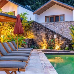 InstyleTouristik_RuandaGorillaSafari-luxury_copyright GoVacBlackThe Retreat Main Salt Water Pool and Jacuzzi sunset